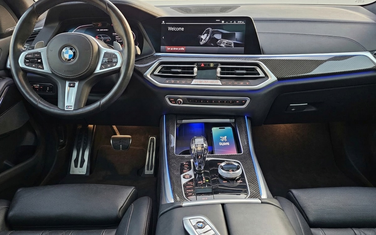 2023 BMW X5 M50i in Matte Black — gallery photo 5 in Dubai