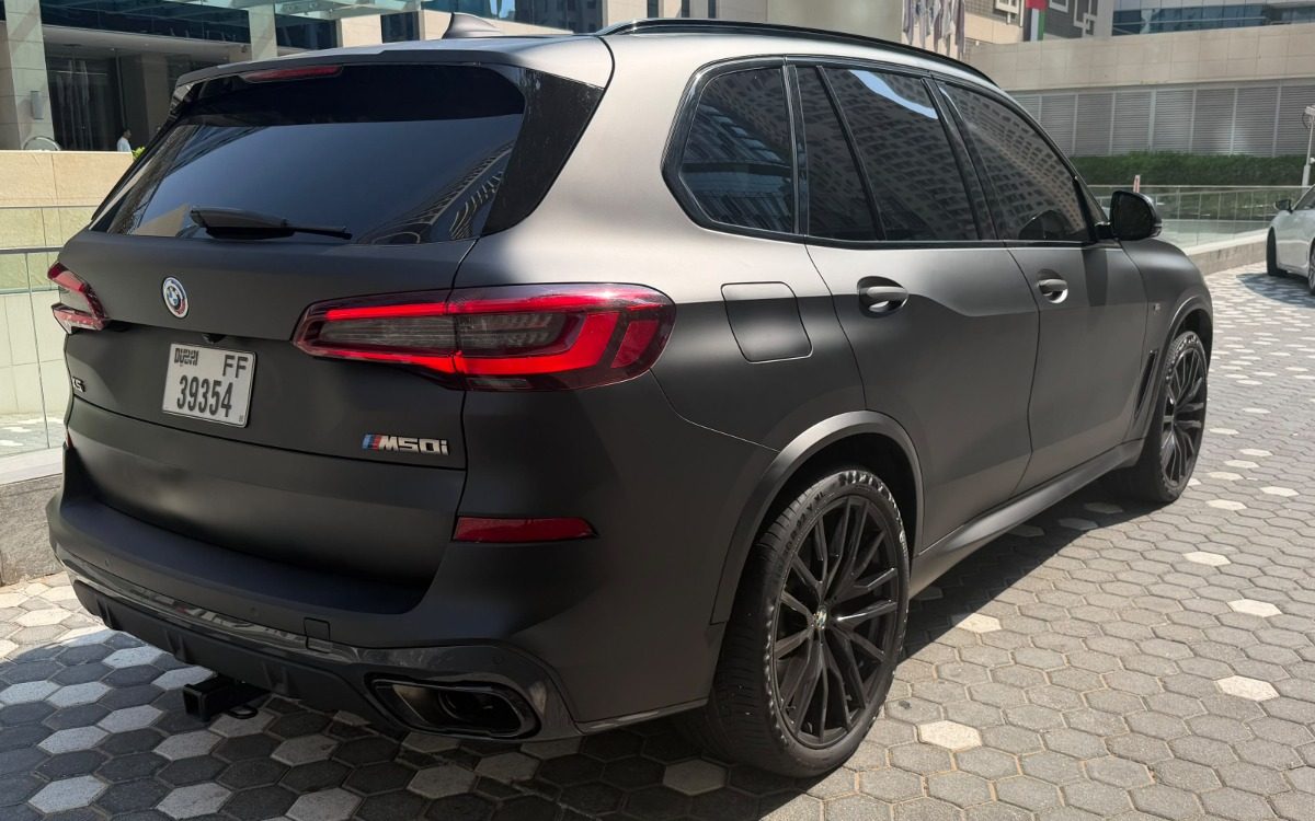 2023 BMW X5 M50i in Matte Black — gallery photo 3 in Dubai