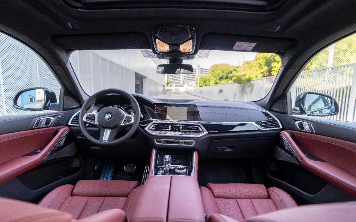 2024 BMW X6 M50i in Solid Black — gallery photo 6 in Dubai